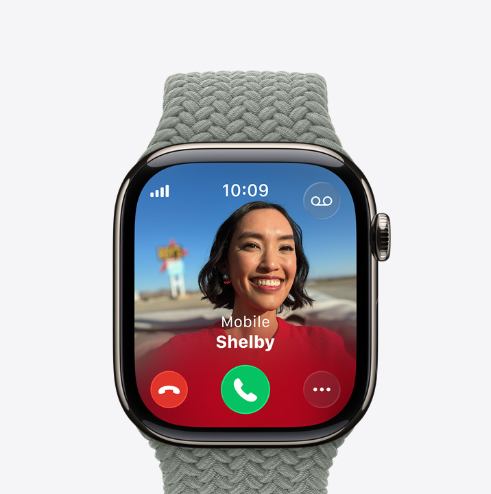 Apple Watch Series 11, titanium case, natural colour, incoming call, contact photo, accept and decline call buttons, right side exterior, Digital Crown, Braided Solo Loop, forest colour