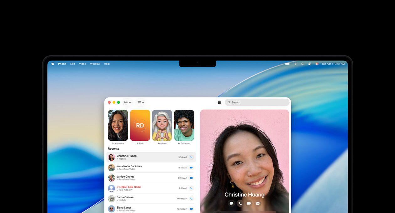 En MacBook Pro och en iPhone bredvid varandra, MacBook Pro-skärmen visar appen Telefon och liveaktiviteter från Uber-appen, iPhone visar Uber-appen