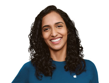 A person wearing a t-shirt with Apple logo printed on the top right