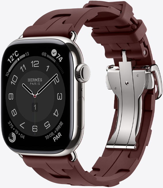 シルバーチタニウムケースのApple Watch Hermès Series 11。ボルドーのキリムストラップに、簡単に取り外せるシルバーのメタルバックルが付いている