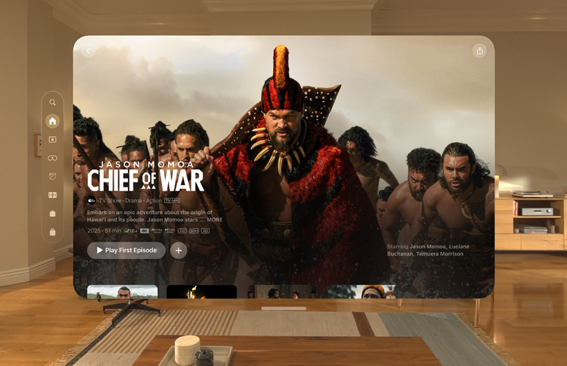 The Apple TV experience of Apple Vision Pro is displayed in a living room, with a still image from the Apple TV series Chief of War