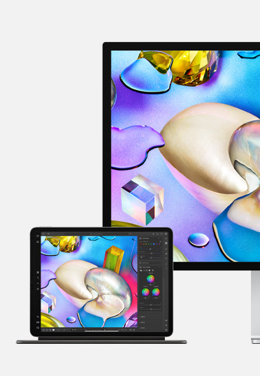 An iPad and a Studio Display showing the same artwork.