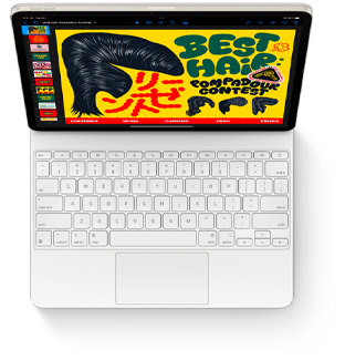 Bovenaanzicht van iPad Air met wit Magic Keyboard voor iPad Air.