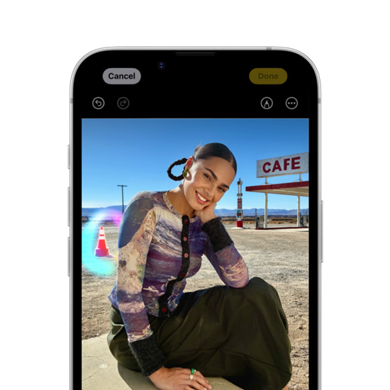 Apple Intelligence Clean Up tool highlighting a background object in a photo on iPhone 16e.