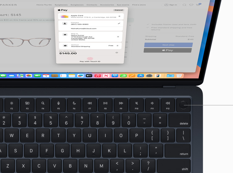 MacBook Air showing user authorizing payment for online shopping purchase using Touch ID